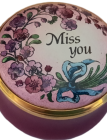Miss You  Halcyon 1.25" diameter. Screw/twist lid. Painted flowers inside lid.