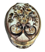 Marquetry (02/6075) 2.12" Oval. Inside Lid: "Design inspired by a marquetry panel on a cabinet avec son pied of c.1665-70 which bears a bronze medal of King Louis XIV. The Wallace Collection." 
