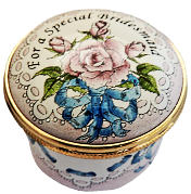 For a Special Bridesmaid (15/084) 1.25" diameter. Screw on and off lid.   Inside lid: a blue ribbon. Made by Marshalls & Staffordshire (3 Marshalls & 2 Staffordshire)