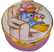 Paddington Bear Sipping Cocoa (Crummles) 1.62" diameter. Inside Lid: "Paddington always looked forward to his elevenses" Bottom stamped: Paddington & Co Ltd Eden Toys Inc. and the Crummles stamp.